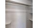 This simple closet offers a rod to hang clothing with shelves for folded items at 208 W Alma St, Overton, NV 89040
