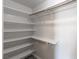 The simple closet offers a rod and a lot of shelves for organization and storage at 208 W Alma St, Overton, NV 89040