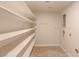 This simple closet offers a lot of shelving to keep all your items stored neatly at 208 W Alma St, Overton, NV 89040