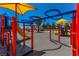 Outdoor playground equipment with colorful slides and climbing structures for play at 208 W Alma St, Overton, NV 89040