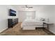 Spacious bedroom featuring a television, a dresser and a comfortable bed at 2451 N Rainbow Blvd # 2131, Las Vegas, NV 89108
