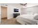 Cozy bedroom featuring soft lighting, a dark dresser, and a large window with blinds at 2451 N Rainbow Blvd # 2131, Las Vegas, NV 89108