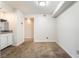 Inviting living area featuring neutral paint, carpeted flooring, and a convenient wet bar at 2451 N Rainbow Blvd # 2131, Las Vegas, NV 89108