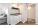 Stylish wet bar featuring granite countertops, white cabinetry, and a sink, perfect for entertaining at 2451 N Rainbow Blvd # 2131, Las Vegas, NV 89108
