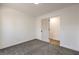 Clean bedroom with carpeting and a view into an additional room at 2529 Indian Sage Way, Las Vegas, NV 89108