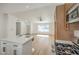 Kitchen and living area are enhanced by the open floor plan that provides natural light and easy access at 2529 Indian Sage Way, Las Vegas, NV 89108