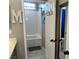 Renovated bathroom featuring a tub with a white subway tile surround at 2585 Amazing Meadows Ave # 1007, North Las Vegas, NV 89031