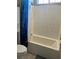 Bright bathtub and shower combo featuring white subway tile surround at 2585 Amazing Meadows Ave # 1007, North Las Vegas, NV 89031