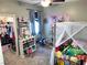 bedroom with closet space and decorative book shelves at 2585 Amazing Meadows Ave # 1007, North Las Vegas, NV 89031