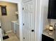 Interior laundry room with updated washer and dryer at 2585 Amazing Meadows Ave # 1007, North Las Vegas, NV 89031
