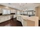 Bright kitchen with white cabinetry, stainless steel appliances, and modern backsplash at 2601 Bechamel Pl, Henderson, NV 89044