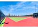 Image shows pristine tennis courts, perfect for sports enthusiasts to enjoy friendly matches under the sunny sky at 2601 Bechamel Pl, Henderson, NV 89044