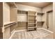 Spacious walk-in closet with built-in shelving and clothing racks at 2601 Bechamel Pl, Henderson, NV 89044