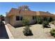 Lovely single-story home with manicured landscaping, neutral colors, and a welcoming curb appeal at 2748 Heritage Cir, Las Vegas, NV 89121