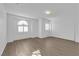 Bright bedroom features wood floors, white walls, and stylish shuttered windows at 2808 Deep Water Cir, Las Vegas, NV 89117