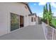 Expansive deck connects to the home with scenic views, offering a perfect blend of indoor-outdoor living at 2808 Deep Water Cir, Las Vegas, NV 89117