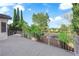 Outdoor deck with decorative railing and lush landscaping offers serene views and enhances outdoor living at 2808 Deep Water Cir, Las Vegas, NV 89117