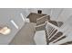 High angle of the entryway featuring wood flooring and a staircase at 2808 Deep Water Cir, Las Vegas, NV 89117