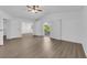 Spacious living room with vaulted ceiling and natural light highlighting the serene indoor-outdoor connection at 2808 Deep Water Cir, Las Vegas, NV 89117