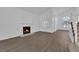 Spacious living room with high ceilings, a fireplace, and large windows for ample sunlight at 2808 Deep Water Cir, Las Vegas, NV 89117