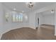 Spacious living room featuring lots of natural light and wood flooring at 2808 Deep Water Cir, Las Vegas, NV 89117