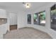 Bright sunroom with tile floors and large windows offering views of the outdoor landscape at 2808 Deep Water Cir, Las Vegas, NV 89117