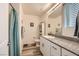 All-white bathroom with modern fixtures, granite counters, tile floors, and a shower/tub combo at 2845 Copper Wind Ln # 4, Las Vegas, NV 89183
