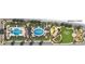 Aerial view of a community featuring adult, Gathering, and pools, a park with a grassy area and dog parks at 2845 Copper Wind Ln # 4, Las Vegas, NV 89183