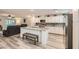 Modern kitchen featuring a spacious island and stainless steel appliances at 2845 Copper Wind Ln # 4, Las Vegas, NV 89183