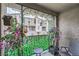 Relaxing patio adorned with colorful flowers and greenery, perfect for outdoor enjoyment at 2845 Copper Wind Ln # 4, Las Vegas, NV 89183