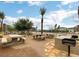 Enjoy this outdoor picnic area with many tables and barbecue grills, surrounded by desert landscaping at 2845 Copper Wind Ln # 4, Las Vegas, NV 89183