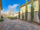 Paver patio with decorative trees and shrubs; a serene outdoor space at 3008 Barrett Springs Ave, Henderson, NV 89044