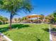 A well-maintained community park with a playground, benches, and lush green space for outdoor enjoyment at 3008 Barrett Springs Ave, Henderson, NV 89044