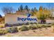 Elegant community entrance sign for Inspirada with beautiful landscaping at 3008 Barrett Springs Ave, Henderson, NV 89044