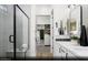 Stylish bathroom with a glass-enclosed shower, double vanity, and modern finishes at 314 Maracas Pl # Lot 193, Henderson, NV 89015