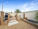 Charming backyard space featuring a brick patio and easy to care for gravel landscaping at 4009 Patterson Ave, Las Vegas, NV 89104
