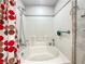 Bathroom featuring a large soaking tub and tiled shower at 4009 Patterson Ave, Las Vegas, NV 89104