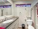 Bathroom features granite countertop, mosaic backsplash, and a modern toilet at 4009 Patterson Ave, Las Vegas, NV 89104