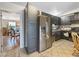 Charming kitchen featuring gray cabinetry, stainless steel appliances, and tile backsplash at 4009 Patterson Ave, Las Vegas, NV 89104