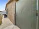 Exterior shot of a side yard with a stucco wall and greenery at 4009 Patterson Ave, Las Vegas, NV 89104