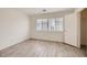 Bedroom with a two windows and a closet at 4045 Oliver Sagebrush Dr, Las Vegas, NV 89122