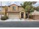 Charming two-story home featuring a neutral color palette, attached two-car garage and manicured landscaping at 4045 Oliver Sagebrush Dr, Las Vegas, NV 89122