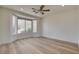 Bright bedroom featuring a bay window allowing ample natural light and light wood flooring at 4379 Bella Cascada St, Las Vegas, NV 89135