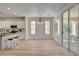 Bright, open kitchen with white cabinetry, stainless steel appliances, and a center island with seating at 4379 Bella Cascada St, Las Vegas, NV 89135