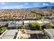 Scenic aerial view of a well-developed suburban community with tidy streets and homes at 5096 Thunder River Cir, Las Vegas, NV 89148