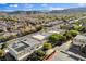 Panoramic aerial shot of a sprawling neighborhood with diverse housing and mature trees at 5096 Thunder River Cir, Las Vegas, NV 89148