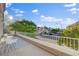 This balcony with tiled floors offers a comfortable seating area with views of the surrounding neighborhood at 5096 Thunder River Cir, Las Vegas, NV 89148