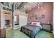 Bright bedroom with a bed, sliding door closet, and industrial-chic design creating a modern, inviting space at 5096 Thunder River Cir, Las Vegas, NV 89148
