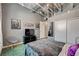 Bright bedroom with a bed, sliding door closet, and industrial-chic design creating a modern, inviting space at 5096 Thunder River Cir, Las Vegas, NV 89148