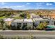 Stylish homes featuring oversized windows, a private plunge pools, and lush landscaping in a desirable neighborhood at 5096 Thunder River Cir, Las Vegas, NV 89148